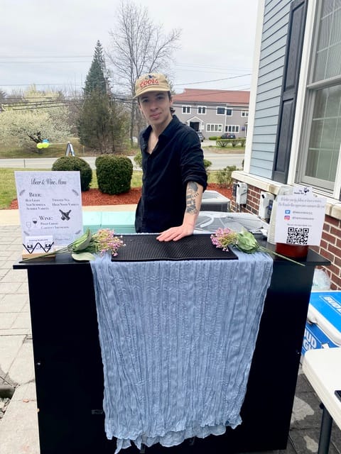 The Wander Bar's mobile bar setup with signature cocktails and garnishes